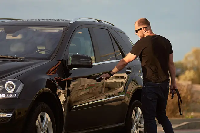 Man beside an SUV
