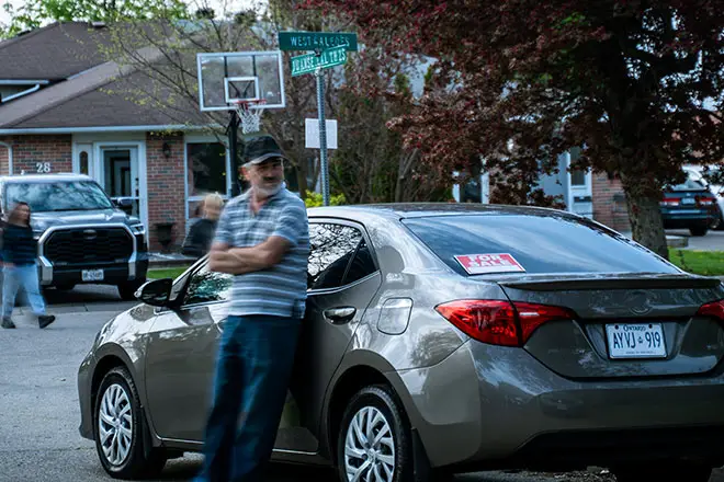 Man beside an SUV